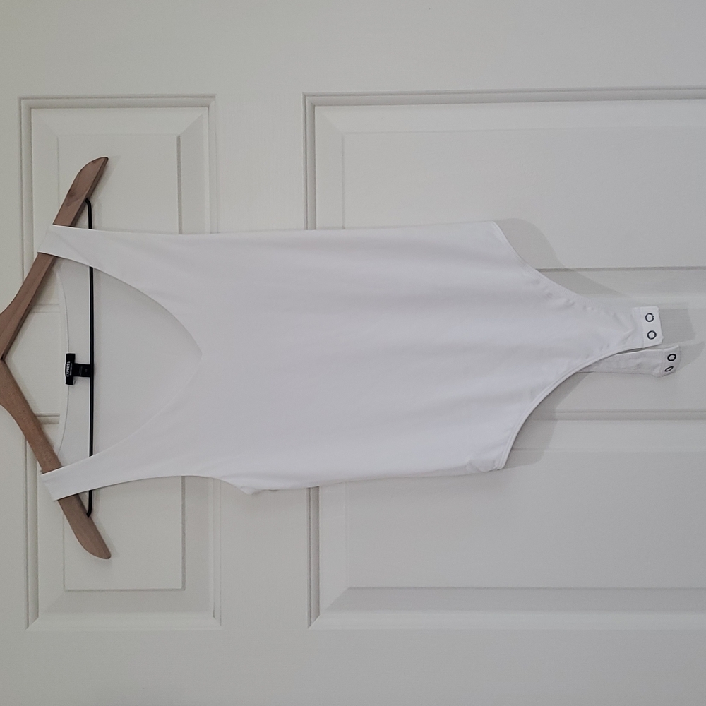 White v neck bodysuit.